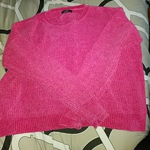 Loose fitting pink knit sweater